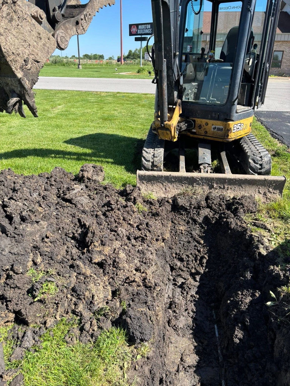 Excavator on underground electrical project