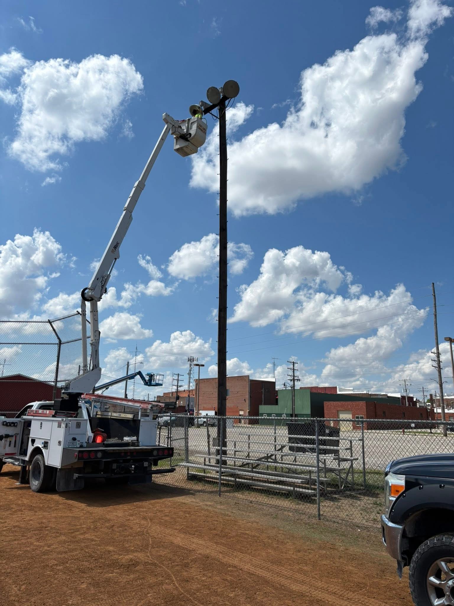 D&M Electric bucket truck on a commercial lighting project